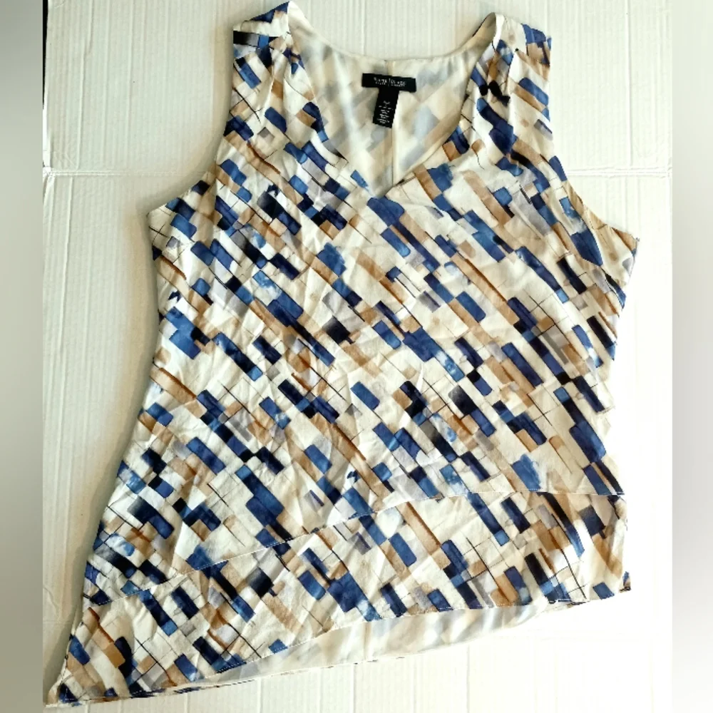 White House Black Market silk assymetrical sleeveless top with geometric…
